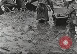 Image of British soldiers in muddy battle in World War 1 France, 1916, second 25 stock footage video 65675066066