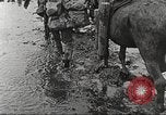 Image of British soldiers in muddy battle in World War 1 France, 1916, second 29 stock footage video 65675066066