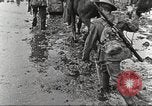 Image of British soldiers in muddy battle in World War 1 France, 1916, second 32 stock footage video 65675066066