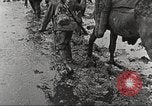 Image of British soldiers in muddy battle in World War 1 France, 1916, second 34 stock footage video 65675066066