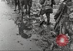 Image of British soldiers in muddy battle in World War 1 France, 1916, second 40 stock footage video 65675066066