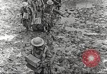 Image of British soldiers in muddy battle in World War 1 France, 1916, second 43 stock footage video 65675066066