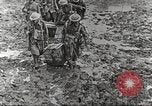 Image of British soldiers in muddy battle in World War 1 France, 1916, second 45 stock footage video 65675066066