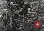 Image of British soldiers in muddy battle in World War 1 France, 1916, second 48 stock footage video 65675066066