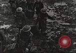 Image of British soldiers in muddy battle in World War 1 France, 1916, second 49 stock footage video 65675066066