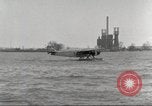 Image of Ford Tri-moter Float plane being tested in water United States USA, 1925, second 14 stock footage video 65675066086