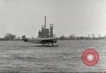 Image of Ford Tri-moter Float plane being tested in water United States USA, 1925, second 17 stock footage video 65675066086