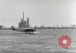 Image of Ford Tri-moter Float plane being tested in water United States USA, 1925, second 18 stock footage video 65675066086