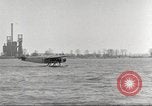 Image of Ford Tri-moter Float plane being tested in water United States USA, 1925, second 22 stock footage video 65675066086