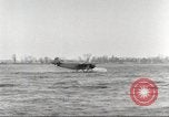 Image of Ford Tri-moter Float plane being tested in water United States USA, 1925, second 26 stock footage video 65675066086