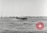 Image of Ford Tri-moter Float plane being tested in water United States USA, 1925, second 27 stock footage video 65675066086