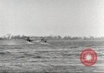 Image of Ford Tri-moter Float plane being tested in water United States USA, 1925, second 32 stock footage video 65675066086
