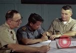 Standbild junk building program Saigon Vietnam, 1965, aus Sekunde 38 historischem Filmmaterial Videoclip 65675066253