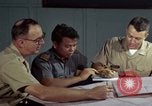 Standbild junk building program Saigon Vietnam, 1965, aus Sekunde 41 historischem Filmmaterial Videoclip 65675066253