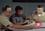 Standbild junk building program Saigon Vietnam, 1965, aus Sekunde 42 historischem Filmmaterial Videoclip 65675066253