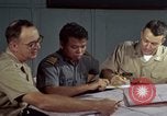 Standbild junk building program Saigon Vietnam, 1965, aus Sekunde 43 historischem Filmmaterial Videoclip 65675066253