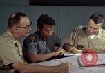 Standbild junk building program Saigon Vietnam, 1965, aus Sekunde 46 historischem Filmmaterial Videoclip 65675066253