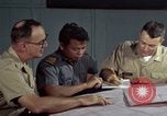 Standbild junk building program Saigon Vietnam, 1965, aus Sekunde 47 historischem Filmmaterial Videoclip 65675066253