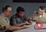 Standbild junk building program Saigon Vietnam, 1965, aus Sekunde 49 historischem Filmmaterial Videoclip 65675066253