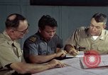 Standbild junk building program Saigon Vietnam, 1965, aus Sekunde 50 historischem Filmmaterial Videoclip 65675066253