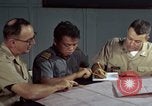 Standbild junk building program Saigon Vietnam, 1965, aus Sekunde 53 historischem Filmmaterial Videoclip 65675066253