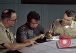Standbild junk building program Saigon Vietnam, 1965, aus Sekunde 54 historischem Filmmaterial Videoclip 65675066253