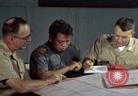 Standbild junk building program Saigon Vietnam, 1965, aus Sekunde 56 historischem Filmmaterial Videoclip 65675066253