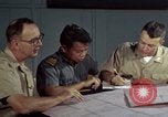 Standbild junk building program Saigon Vietnam, 1965, aus Sekunde 61 historischem Filmmaterial Videoclip 65675066253
