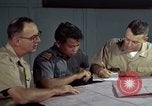 Standbild junk building program Saigon Vietnam, 1965, aus Sekunde 62 historischem Filmmaterial Videoclip 65675066253