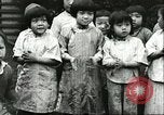 Image of poor children China, 1932, second 21 stock footage video 65675066269
