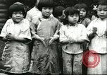 Image of poor children China, 1932, second 22 stock footage video 65675066269