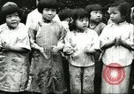 Image of poor children China, 1932, second 23 stock footage video 65675066269