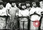 Image of poor children China, 1932, second 24 stock footage video 65675066269