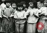 Image of poor children China, 1932, second 26 stock footage video 65675066269