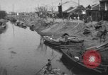 Immagine di Vita dei lavoratori Shanghai in Cina, 1928, secondo 4 filmato di repertorio 65675066304