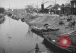 Immagine di Vita dei lavoratori Shanghai in Cina, 1928, secondo 7 filmato di repertorio 65675066304