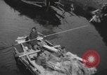Immagine di Vita dei lavoratori Shanghai in Cina, 1928, secondo 12 filmato di repertorio 65675066304