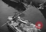 Immagine di Vita dei lavoratori Shanghai in Cina, 1928, secondo 13 filmato di repertorio 65675066304