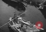 Immagine di Vita dei lavoratori Shanghai in Cina, 1928, secondo 14 filmato di repertorio 65675066304