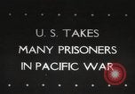 Image of Japanese prisoners Pacific Theater, 1945, second 1 stock footage video 65675066616