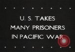 Image of Japanese prisoners Pacific Theater, 1945, second 3 stock footage video 65675066616