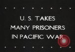 Image of Japanese prisoners Pacific Theater, 1945, second 5 stock footage video 65675066616