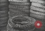 Image of tire remover United States USA, 1947, second 8 stock footage video 65675066620