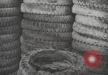 Image of tire remover United States USA, 1947, second 9 stock footage video 65675066620