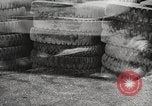 Image of tire remover United States USA, 1947, second 11 stock footage video 65675066620