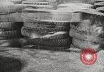 Image of tire remover United States USA, 1947, second 12 stock footage video 65675066620