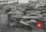 Image of tire remover United States USA, 1947, second 18 stock footage video 65675066620