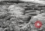 Image of tire remover United States USA, 1947, second 19 stock footage video 65675066620