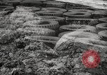 Image of tire remover United States USA, 1947, second 20 stock footage video 65675066620