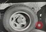 Image of tire remover United States USA, 1947, second 29 stock footage video 65675066620